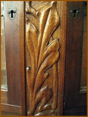 Detail heart shaped escutcheon & carved panel. 